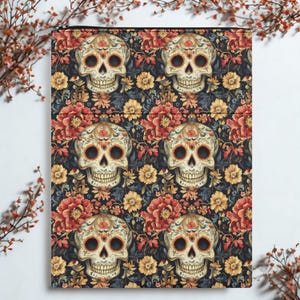 May include: A decorative zippered pouch featuring a repeating pattern of sugar skulls and floral elements. The skulls are cream-colored with intricate details, set against a dark background with red, yellow, and blue flowers.