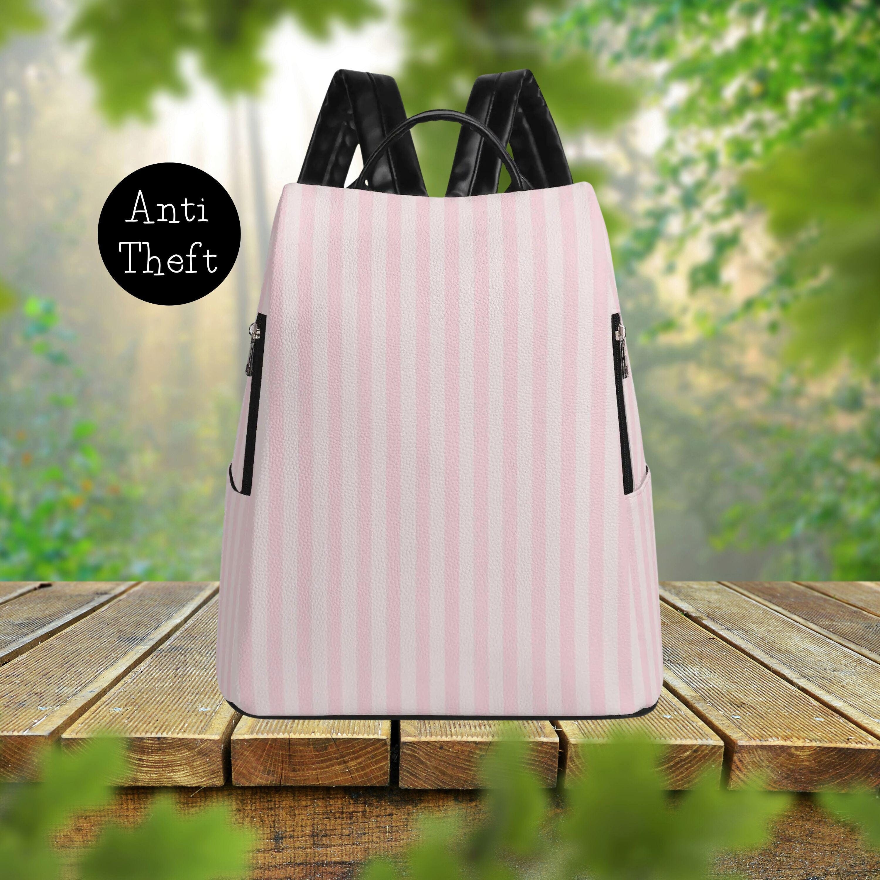 designer white leather backpack Rose Original The FH Wadsworth Black Leather Striped Backpack is both stylish and functional Black and pink leopard giani