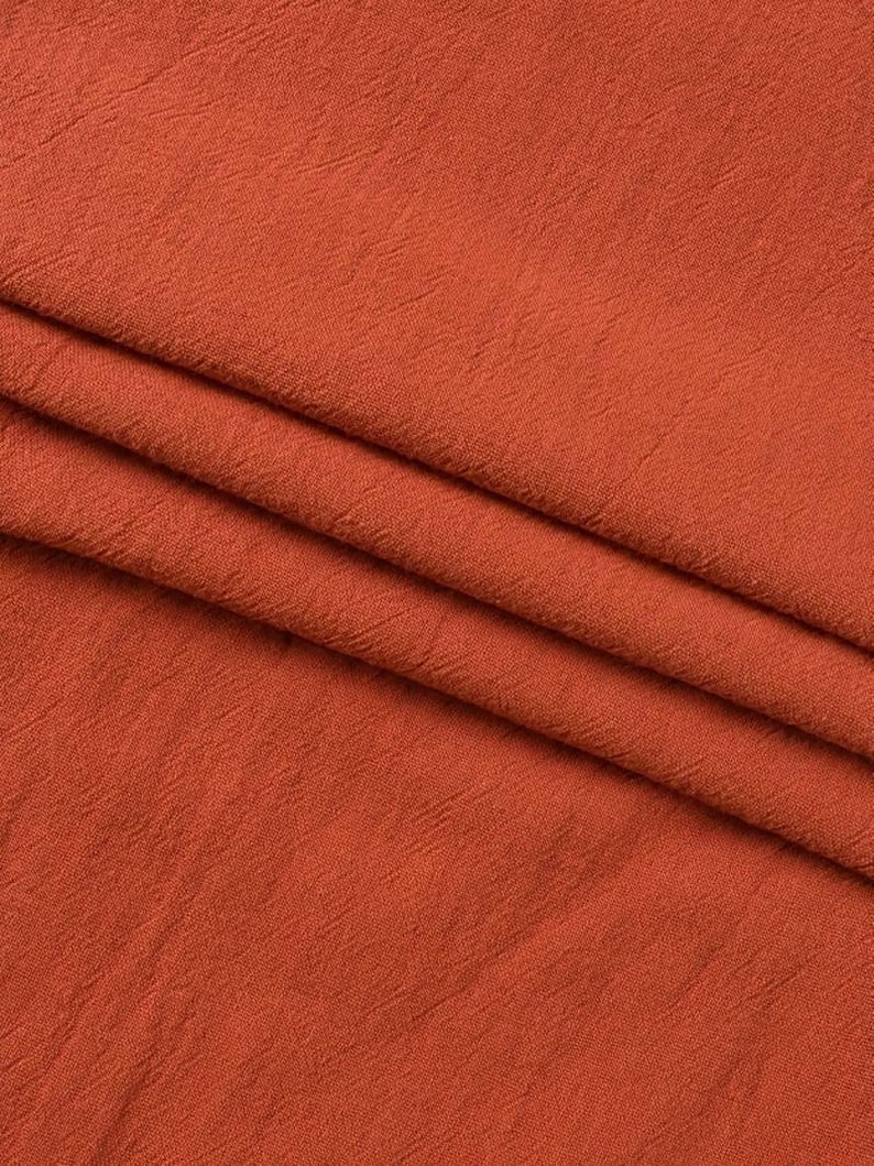 a close up of an orange fabric