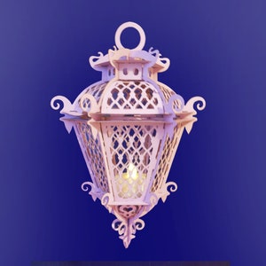 May include: A white wooden lantern with intricate cutouts and a candle inside. The lantern has a decorative top with a ring and a pointed bottom.