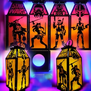 May include: Six Star Wars themed lanterns with different characters from the movie franchise. The lanterns are made of metal and have a black finish. The characters include Darth Vader, Yoda, Princess Leia, Luke Skywalker, Han Solo, and Chewbacca. The lanterns are lit up and the characters are visible through the translucent panels.