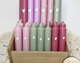 Taper candles in great pastel shades with heart detail now in different sizes