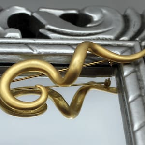 Vintage matte gold swirl brooch Modernist twisted pin Long distance gift for girlfriend Mid century costume jewelry