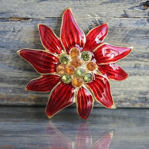 Vintage Christopher Radko poinsettia brooch Mid century costume jewelry Christmas rhinestone enamel red flower brooch