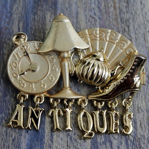 Vintage signed AJC gold tone brooch with charms Antique dealer gift Antiques jewelry