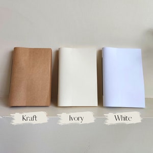 Ricariche per taccuini in pelle riutilizzabili di Bold Action, kraft, avorio e bianco