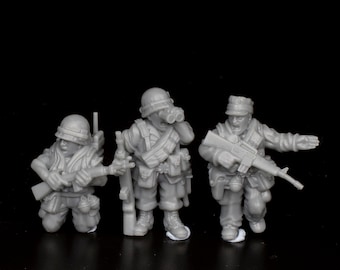 May include: Three gray plastic toy soldiers in military uniforms. The soldier on the left is kneeling and holding a rifle. The soldier in the middle is standing and holding binoculars. The soldier on the right is standing and holding a rifle and pointing with his right hand.