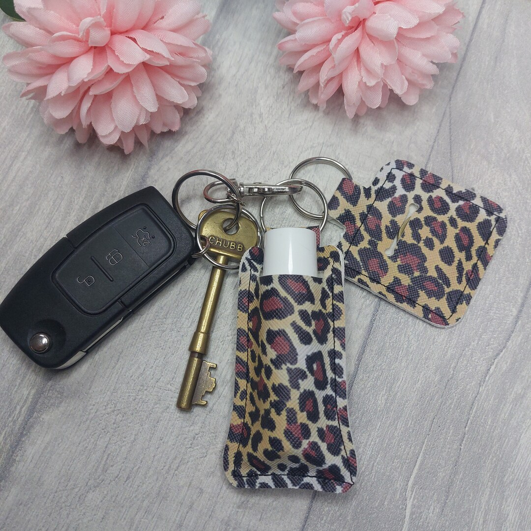 KEYRING SET : Leopard Print Lip Balm Holder and Trolley Pound Coin ...