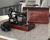 Singer Sewing machine in Bentwood case built in St John s factory Quebec 1948-1954