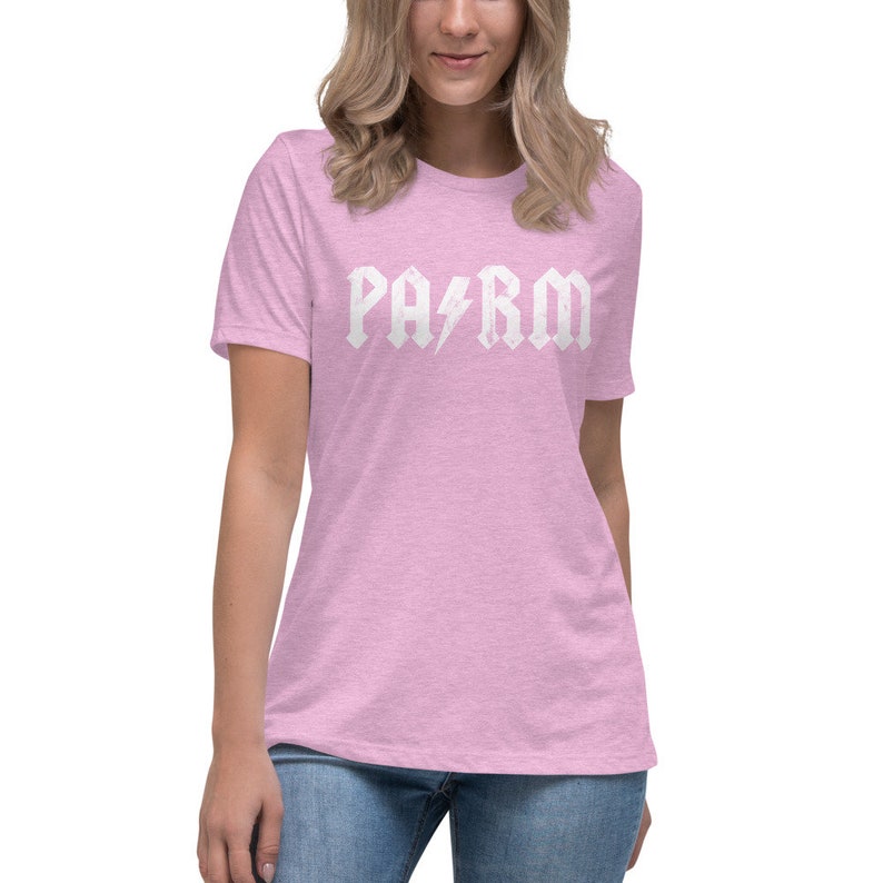 May include: A pink t-shirt with a white graphic that says "PA-RM" in a rock and roll style font with a lightning bolt between the words.