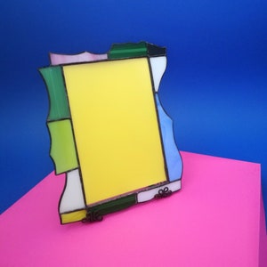 Unusual stained glass photo frame. Frame made of colored glass. Interesting Thanksgiving gift