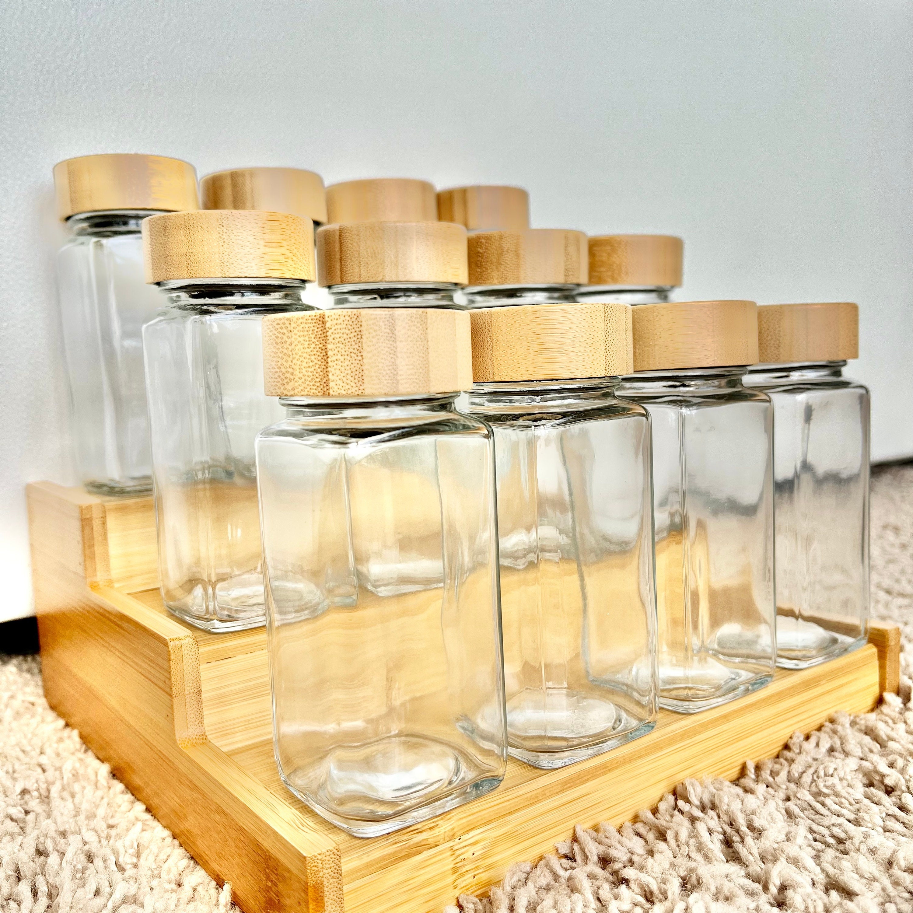Elevated Habitat 12 eco-friendly Spice Jars Glass with airtight silicone  seals, bamboo lids and 130 pre printed spice labels. Storage containers
