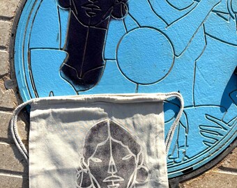 Cartagena Manhole Print Drawstring Backpack – Handmade Spain Souvenir with GPS Coordinates