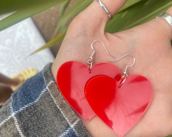 Large red acrylic heart earrings
