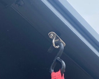 RV Awning Tie-down brackets. Stainless steel brackets and fasteners.