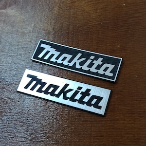2x Makita- Silver or Gold logo - Metallic