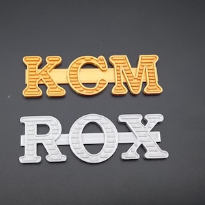 Personlig logotyp i VOX-stil. 3D-utskrift.