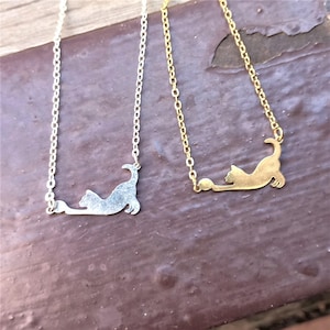 Lovely necklace with original pendant of a cat playing with a ball. Hypoallergenic stainless steel jewelry. Cute dainty gift for cat lovers