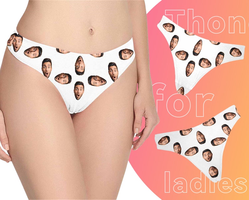 May include: White underwear with a repeating pattern of a man's face. The underwear is shown on a model. The text "Thongs for ladies" is visible in the background.