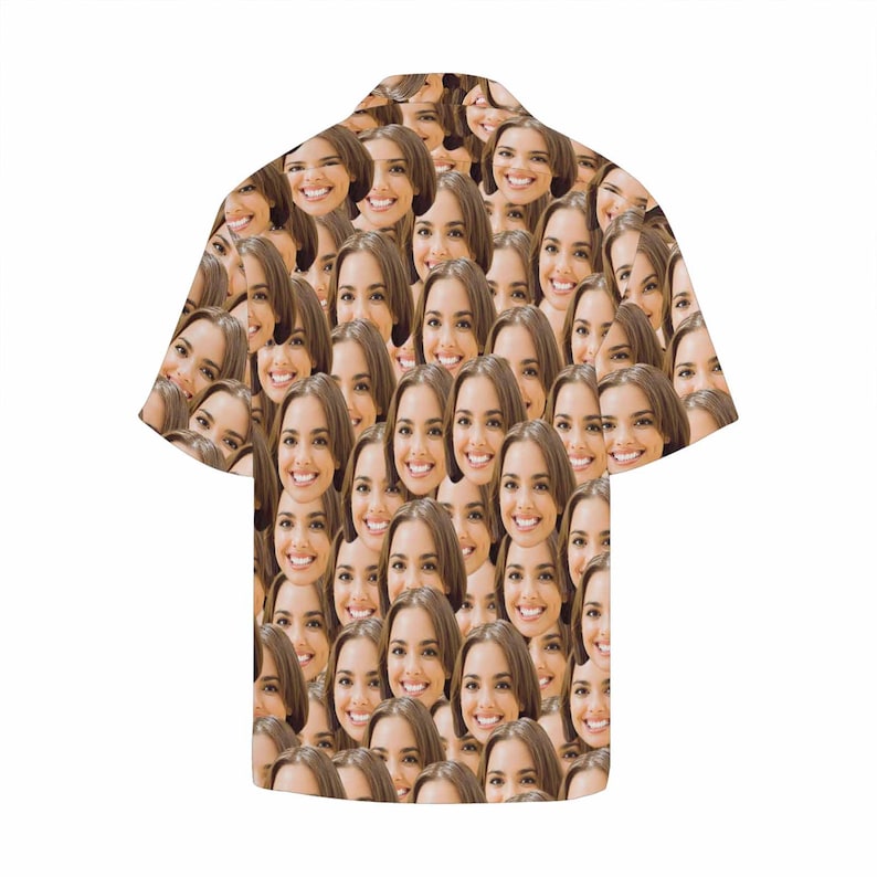 May include: A short-sleeved button-down shirt with a pattern of many faces. The faces are all of the same person, and they are arranged in a random pattern.