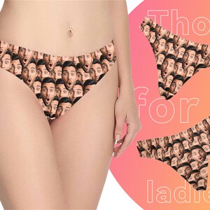 May include: A pair of black and white underwear with a pattern of many faces. The underwear is made of a soft, stretchy fabric and has a low rise.