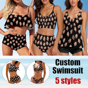 May include: Five different styles of custom swimsuits with a face print pattern. The swimsuits are black with a variety of styles including a halter top, a tankini, and a one-piece.