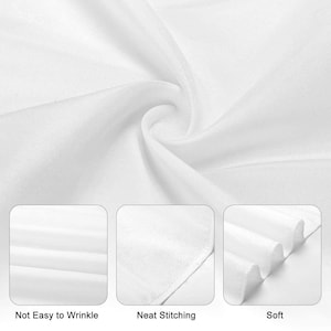 May include: Close-up of white fabric with a soft texture. The image highlights the fabric's features, including its resistance to wrinkles and neat stitching. The word "Soft" is also displayed.