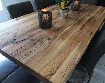 Solid oak dining table with metal legs by choice.Unique wild oak tables