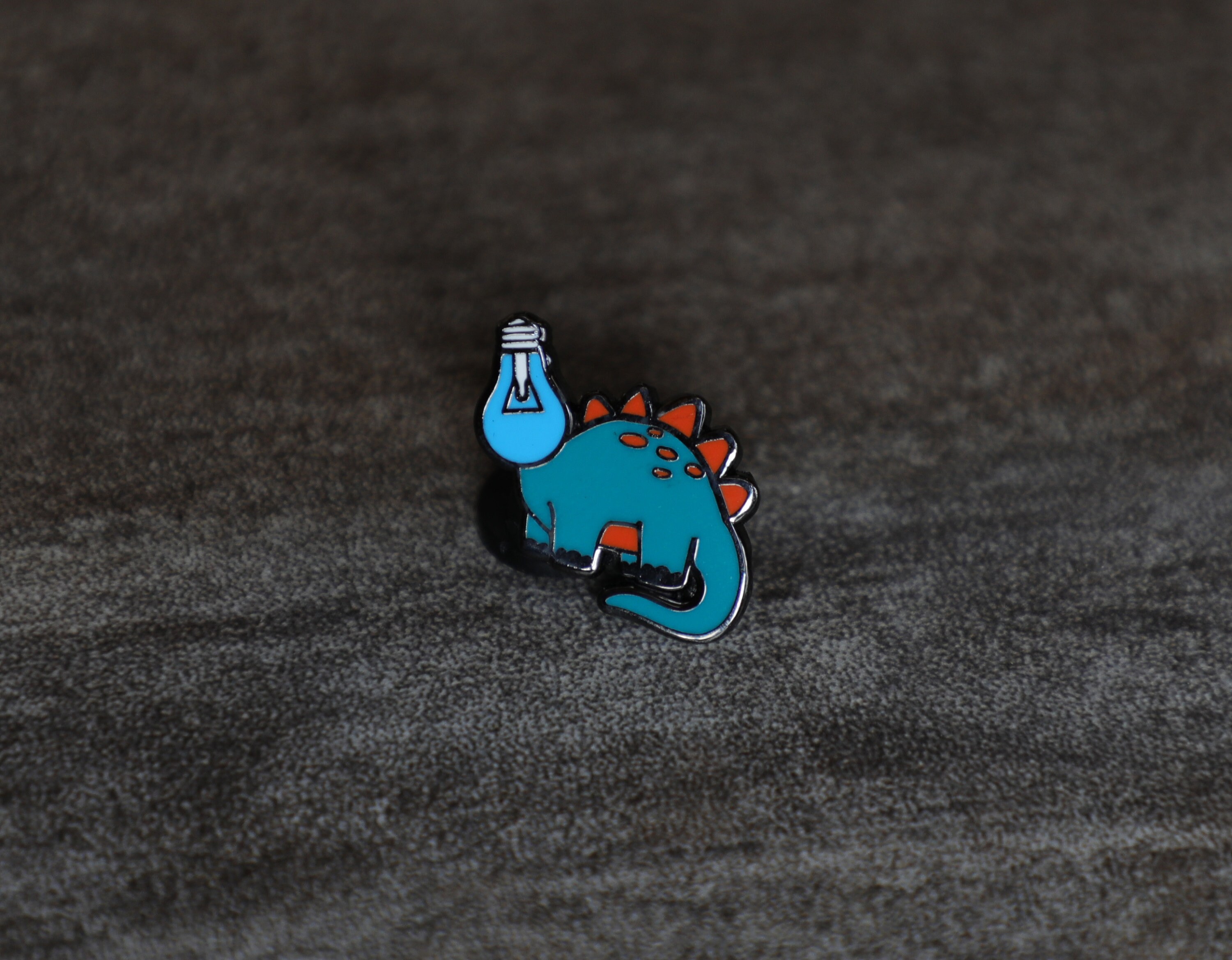 dinosaur with bulb on head