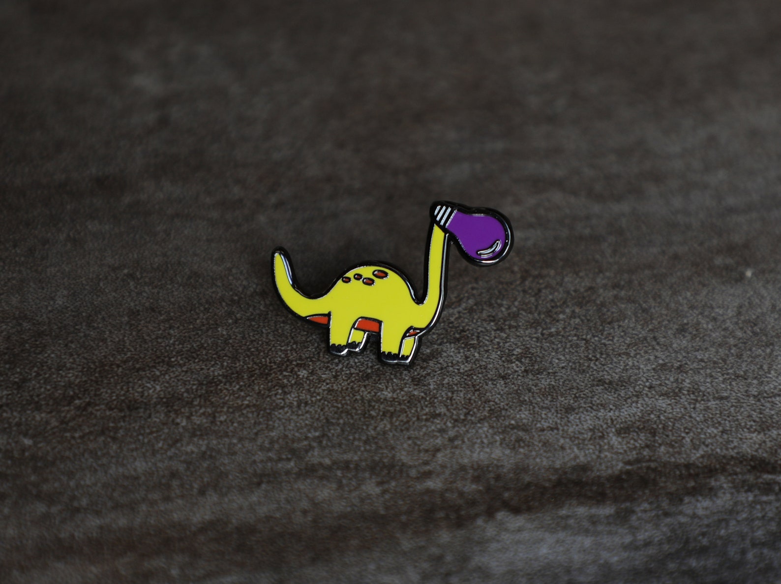 dinosaur with bulb on head