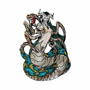 May include: Embroidered patch featuring a fantasy creature with a woman's upper body and a serpent's lower body. The design includes green hair, horns, and a detailed scale pattern in shades of blue, yellow, and brown.