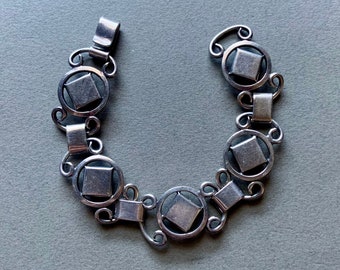 Pulsera de eslabones de plata de ley Ella L. Cone xTo