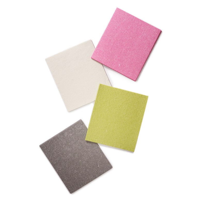 May include: Four square cleaning cloths in different colors: pink, white, green, and gray. The cloths are made of a textured material and are ideal for cleaning.