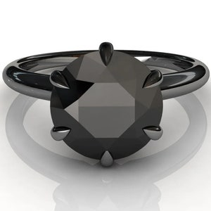 Fake black 2024 diamond ring