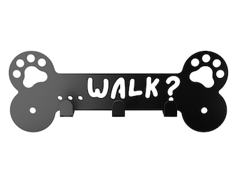 May include: Black metal dog bone shaped key holder with three hooks and the text "...WALK?" in white. The ends of the bone are shaped like paw prints.