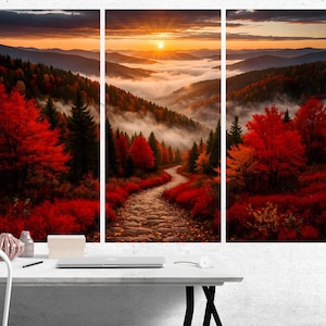 May include: A three-part landscape print depicting a winding stone path through a forest. The trees display vibrant red and orange foliage, with a sunrise over the misty mountains in the background. The artwork evokes a sense of autumn and natural beauty.