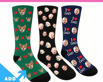 May include: Three pairs of crew socks featuring custom photo prints. The green pair has corgi faces and red hearts. The black pair displays various human and dog faces. The navy blue pair features baby faces with the text I heart DAD.