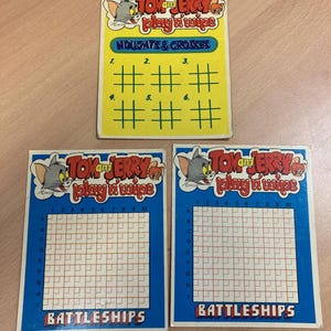Tarjetas de juego de Tom y Jerry y Battleships Play 'n' Wipe de Shredded Wheat 1976 - Juguete promocional publicitario de cereales Shreddies en inglés RARO