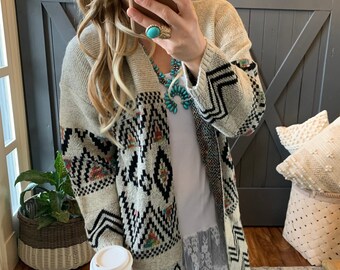 native print sweaters