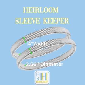 May include: Two silver Heirloom Sleeve Keepers, each with a .4" width and a 2.56" diameter, are displayed on a light blue background. The text "HEIRLOOM SLEEVE KEEPER" is at the top, and the logo is at the bottom.