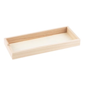 May include: A rectangular wooden tray with a light brown finish and a white interior. The tray is empty and ready to be filled.