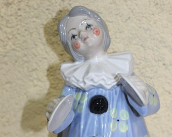 Porcelain figurine of a clown.