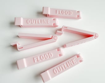Clips para mangas pasteleras impresos en 3D (el color puede variar).