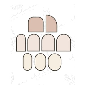Puede incluir: Un juego de nueve cortadores de galletas en varias formas, incluyendo arcos y círculos. Los cortadores están hechos de metal y tienen un acabado marrón claro.