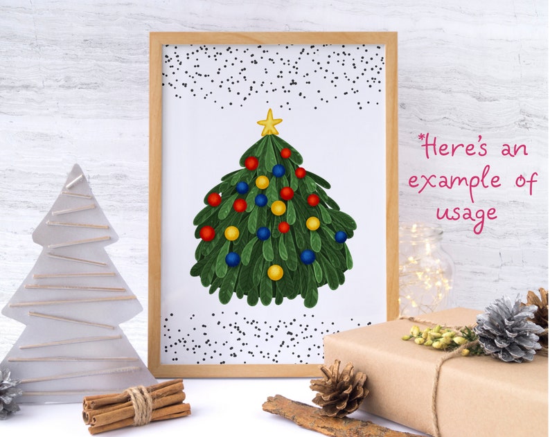 May include: A framed illustration of a green Christmas tree decorated with red, yellow, and blue ornaments. The tree has a gold star on top. The frame is brown wood with a white background. The text "Here's an example of usage" is written in pink.