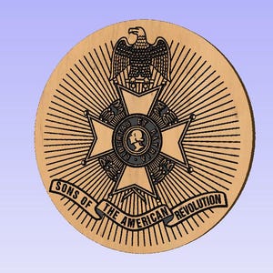 May include: A round wooden plaque with a black and white image of an eagle, a cross, and the text "Sons of the American Revolution".