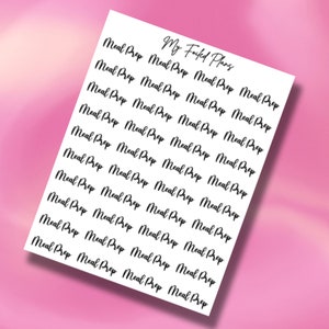 May include: A sheet of white paper with the phrase "My Foiled Plans" written in black cursive at the top. The rest of the sheet is filled with the phrase "Meal Prep" repeated in black cursive.