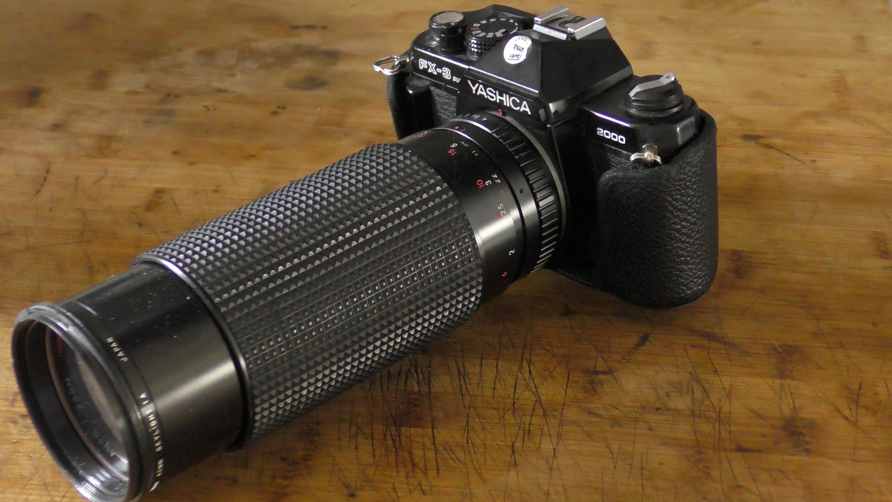 Yashica FX-3 Super 2000 + Nagon Lens 60-300 1:4.0-5.6 +