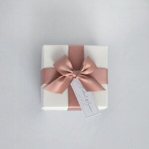 Rose Gold wedding favour box with tag.