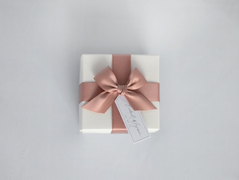 Rose Gold wedding favour box with tag.